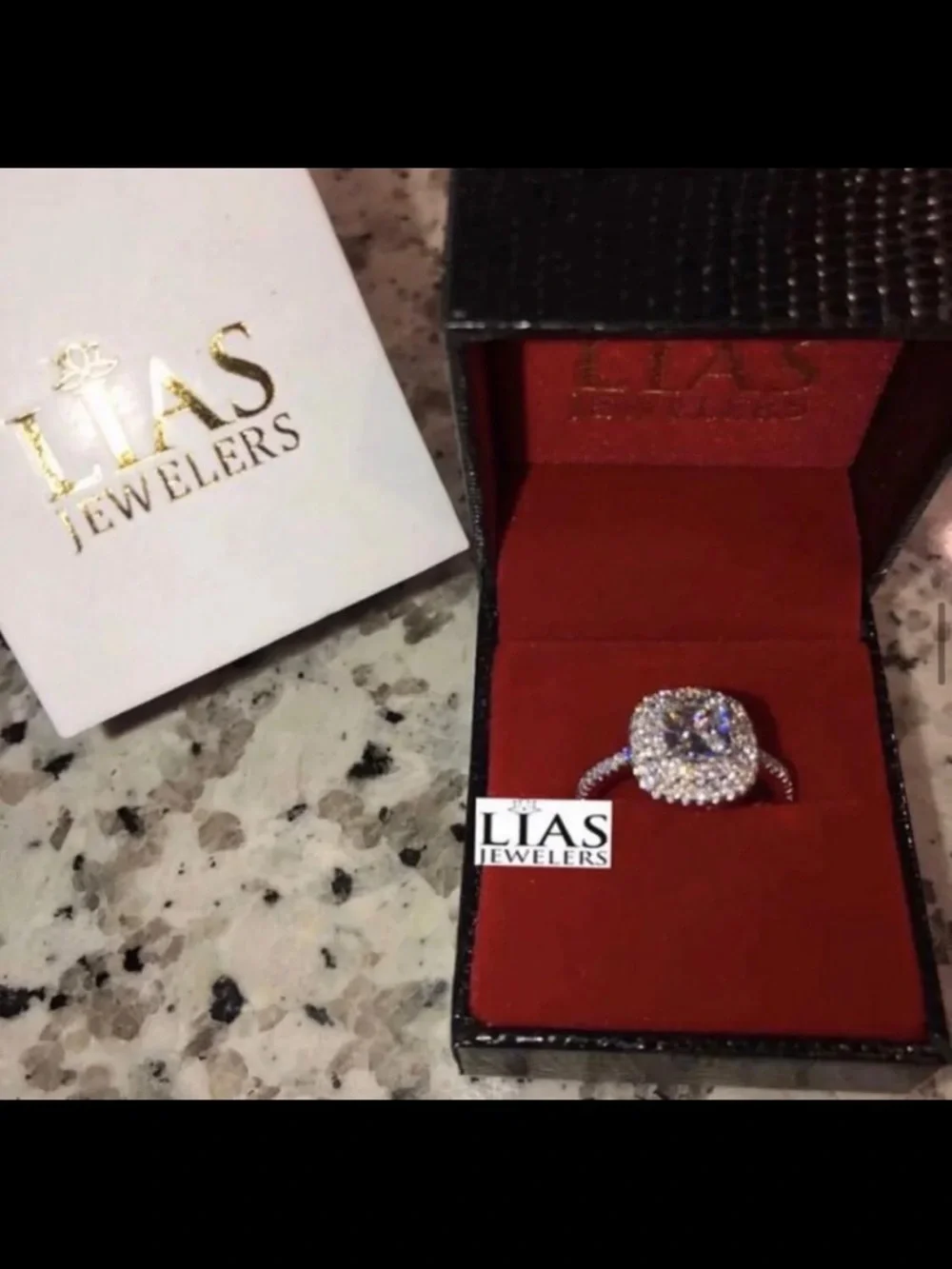 New 18k white gold engagement ring